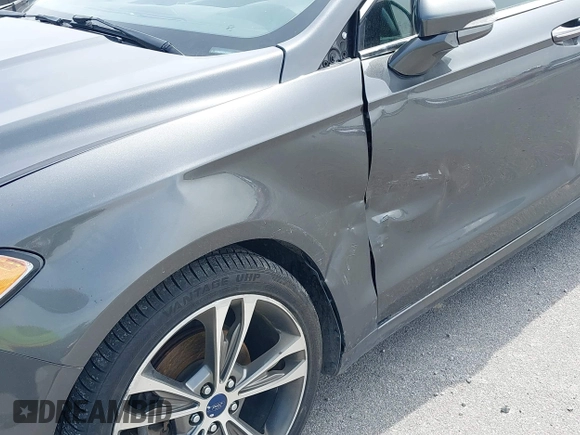 2017 Ford Fusion Titanium with VIN 3FA6P0D93HR261526, listed as a IAAI auction lot 42277350 with 117,388 mi miles and . Bid and sale history available at DreamBid. Image 17.