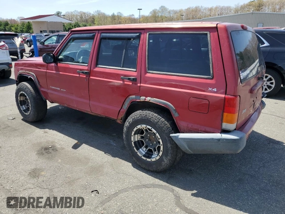 1999 Jeep Cherokee Sport z VIN 1J4FF68S7XL590900, wystawiony jako Copart lot #55098635 z przebiegiem 265 588 mil mil oraz Szkoda całkowita • Salvage title. Historia ofert i sprzedaży dostępna na DreamBid. Obrazek 2.