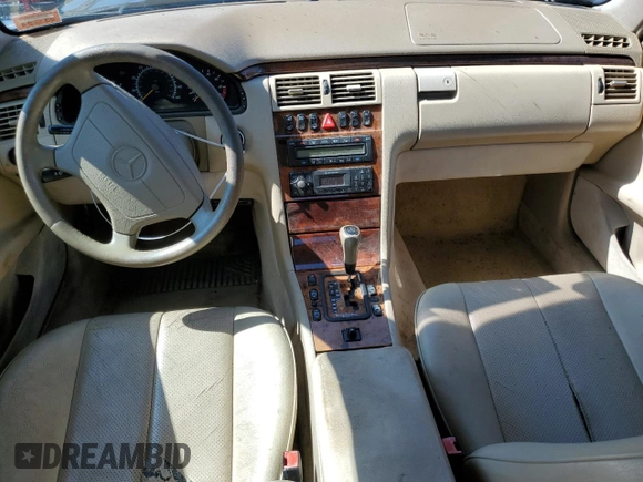 1999 Mercedes-Benz E-Class with VIN WDBJH82F8XX020574, listed as a Copart auction lot 63730124 with 201,401 mi miles and Salvage Title. Bid and sale history available at carsss.com. Image 8.