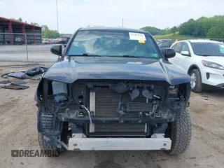 2015 Toyota Tacoma PreRunner with VIN 3TMJU4GN5FM189557, listed as a IAAI auction lot 42387542 with 189,188 mi miles and . Bid and sale history available at DreamBid. Image 12.
