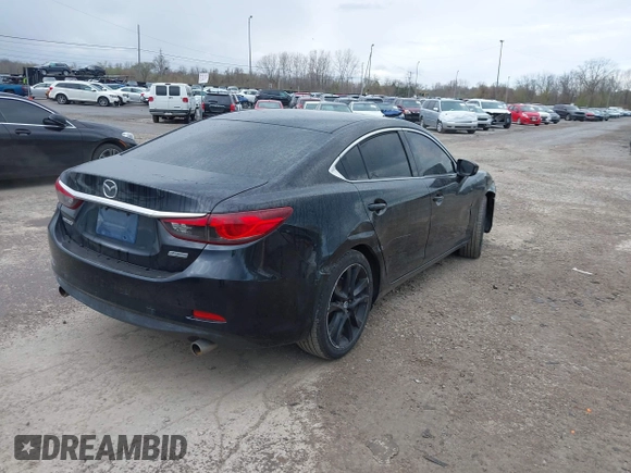 2014 Mazda Mazda6 i Touring with VIN JM1GJ1V68E1128650, listed as a IAAI auction lot 42035713 with 171,609 mi miles. Bid and sale history available at carsss.com. Image 4.