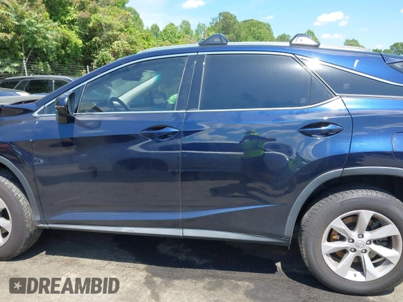 2016 Lexus RX 350 with VIN JTJBZMCA2G2001429, listed as a IAAI auction lot 42202436 with Not provided miles and . Bid and sale history available at DreamBid. Image 14.