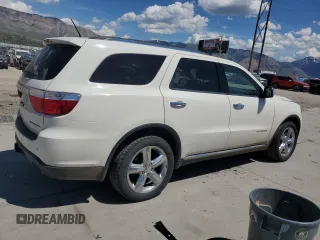 2012 Dodge Durango Citadel with VIN 1C4SDJET7CC309313, listed as a Copart auction lot 56491065 with 154,116 mi miles and Salvage title. Bid and sale history available at DreamBid. Image 3.
