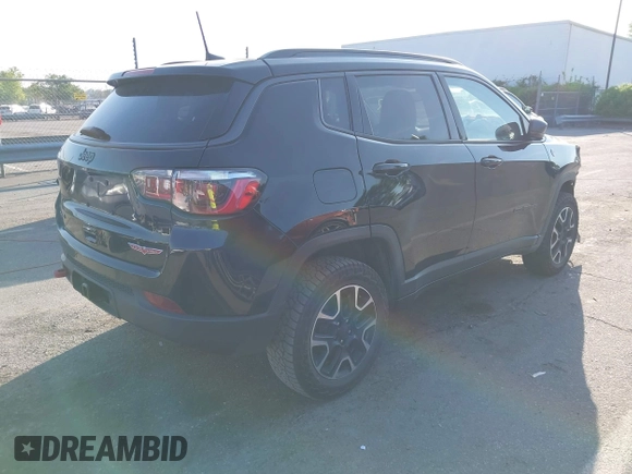 2019 Jeep Compass Trailhawk with VIN 3C4NJDDB5KT800515, listed as a IAAI auction lot 42059594 with 60,338 mi miles and . Bid and sale history available at DreamBid. Image 4.
