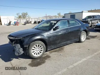 2012 Chrysler 300 with VIN 2C3CCAAG9CH201079, listed as a Copart auction lot 80343504 with 137,593 mi miles and Salvage Title. Bid and sale history available at carsss.com. Image 1.