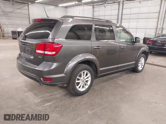 2017 Dodge Journey SXT with VIN 3C4PDDBG1HT512398, listed as a IAAI auction lot 42098784 with 123,946 mi miles and . Bid and sale history available at DreamBid. Image 4.