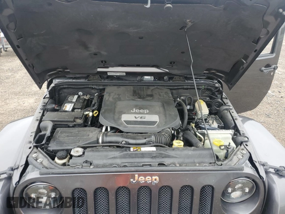 2014 Jeep Wrangler Unlimited Sahara with VIN 1C4HJWEG7EL299548, listed as a Copart auction lot 58522355 with 76,057 mi miles and Clean title. Bid and sale history available at DreamBid. Image 12.