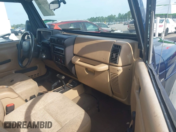 2002 Jeep Wrangler Sport with VIN 1J4FA49S72P729703, listed as a IAAI auction lot 42468446 with 164,342 mi miles and . Bid and sale history available at DreamBid. Image 5.