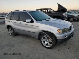 2002 BMW X5 3.0i with VIN 5UXFA535X2LP50341, listed as a Copart auction lot 73180214 with 0 mi miles and Salvage Title. Bid and sale history available at carsss.com. Image 4.