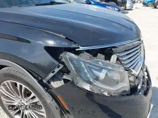 2016 Lincoln MKX Reserve with VIN 2LMTJ6LP9GBL27835, listed as a IAAI auction lot 42175905 with 87,541 mi miles. Bid and sale history available at carsss.com. Image 20.
