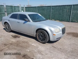2007 Chrysler 300 with VIN 2C3KA43R67H664434, listed as a IAAI auction lot 41884172 with 238,451 mi miles. Bid and sale history available at carsss.com. Image 1.