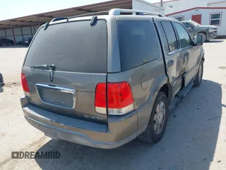 2004 Lincoln Aviator Luxury z VIN 5LMEU68H74ZJ01196, wystawiony jako IAAI lot #41853470 z przebiegiem 102 112 mil mil oraz . Historia ofert i sprzedaży dostępna na DreamBid. Obrazek 4.