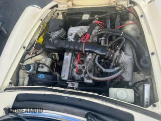 1985 Alfa Romeo Spider Veloce z VIN ZARBA5415F1020937, wystawiony jako Copart lot #63728494 z przebiegiem 115 547 mil mil oraz Tytuł czysty. Historia ofert i sprzedaży dostępna na DreamBid. Obrazek 7.