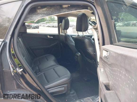 2020 Ford Escape SE Sport Hybrid with VIN 1FMCU9BZ4LUC25970, listed as a IAAI auction lot 42404984 with 102,651 mi miles and . Bid and sale history available at DreamBid. Image 8.