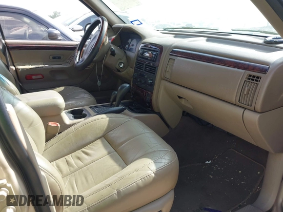 2001 Jeep Grand Cherokee Limited with VIN 1J4GW58N51C575036, listed as a IAAI auction lot 42573849 with 223,757 mi miles and . Bid and sale history available at DreamBid. Image 5.