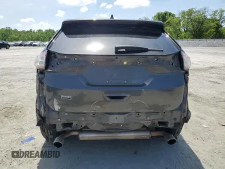 2018 Ford Edge SE с VIN 2FMPK3G90JBC30163, выставлен на аукционе Copart как лот 54497925 с пробегом 300 588 миль миль и Списание • Salvage title. История ставок и продаж доступна на DreamBid. Изображение 6.