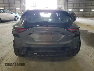 2017 Infiniti QX30 Premium with VIN SJKCH5CP9HA019936, listed as a Copart auction lot 58857575 with 91,591 mi miles and Salvage title. Bid and sale history available at DreamBid. Image 6.