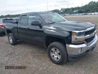 2017 Chevrolet Silverado 1500 LT with VIN 1GCVKREH7HZ158118, listed as a IAAI auction lot 40445118 with 135,466 mi miles and . Bid and sale history available at DreamBid. Image 1.