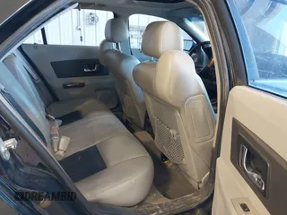 2003 Cadillac CTS with VIN 1G6DM57N630145426, listed as a IAAI auction lot 42141105 with 203,859 mi miles. Bid and sale history available at carsss.com. Image 8.