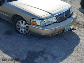 2004 Mercury Grand Marquis LS Premium with VIN 2MEFM75W14X606756, listed as a IAAI auction lot 41572470 with 106,498 mi miles. Bid and sale history available at carsss.com. Image 12.