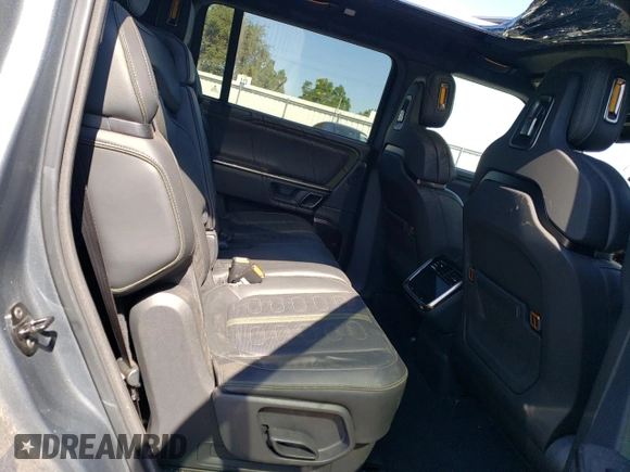 2024 Rivian R1S Adventure with VIN 7PDSGCBA1RN038230, listed as a Copart auction lot 73346304 with 0 mi miles and Salvage Title. Bid and sale history available at carsss.com. Image 12.