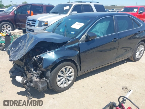 2016 Toyota Camry XLE with VIN 4T4BF1FK3GR535768, listed as a IAAI auction lot 41988698 with 157,452 mi miles. Bid and sale history available at carsss.com. Image 18.