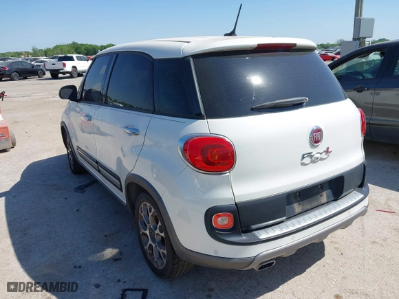 2014 FIAT 500L Trekking with VIN ZFBCFADH2EZ007586, listed as a IAAI auction lot 42040589 with 69,793 mi miles. Bid and sale history available at carsss.com. Image 3.