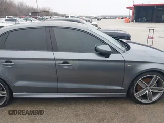 2016 Audi A3 Premium z VIN WAUA7GFF0G1029326, wystawiony jako IAAI lot #41528150 z przebiegiem 96 955 mil mil oraz . Historia ofert i sprzedaży dostępna na DreamBid. Obrazek 13.