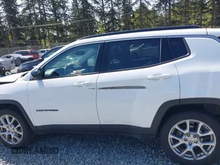 2022 Jeep Compass Latitude Lux with VIN 3C4NJDFB6NT164933, listed as a IAAI auction lot 42116735 with 55,397 mi miles and . Bid and sale history available at DreamBid. Image 14.