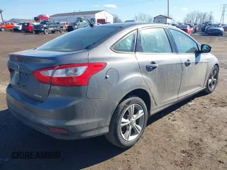 2014 Ford Focus SE with VIN 1FADP3F28EL388713, listed as a IAAI auction lot 41667908 with 125,294 mi miles. Bid and sale history available at carsss.com. Image 4.