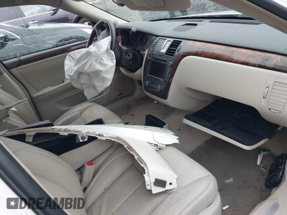 2010 Cadillac DTS 1SD z VIN 1G6KH5EYXAU121435, wystawiony jako IAAI lot #42175287 z przebiegiem Nie podano mil oraz . Historia ofert i sprzedaży dostępna na DreamBid. Obrazek 5.