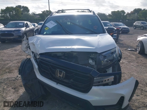 2023 Honda Ridgeline Black Edition with VIN 5FPYK3F81PB006534, listed as a IAAI auction lot 41947335 with 38,127 mi miles and . Bid and sale history available at DreamBid. Image 6.
