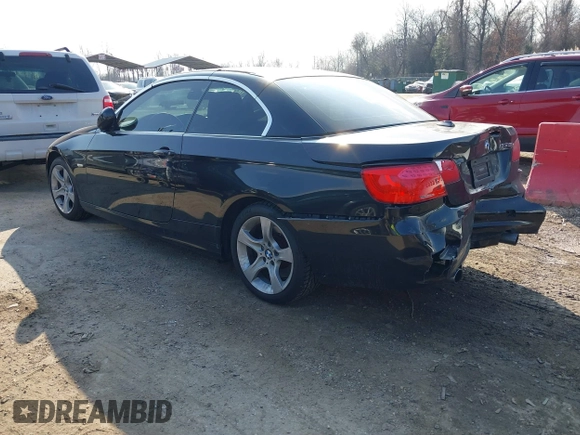 2013 BMW 3 Series 335i with VIN WBADX7C52DJ590132, listed as a IAAI auction lot 41486602 with 154,984 mi miles and . Bid and sale history available at DreamBid. Image 3.