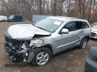2013 Jeep Grand Cherokee Laredo with VIN 1C4RJFAGXDC537367, listed as a IAAI auction lot 41906921 with 124,679 mi miles. Bid and sale history available at carsss.com. Image 14.