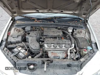 2004 Honda Civic LX z VIN 2HGES16534H535772, wystawiony jako IAAI lot #42285213 z przebiegiem 201 122 mil mil oraz . Historia ofert i sprzedaży dostępna na DreamBid. Obrazek 10.