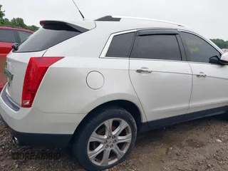 2010 Cadillac SRX Premium Collection z VIN 3GYFNCEY4AS569787, wystawiony jako IAAI lot #42524167 z przebiegiem 222 000 mil mil oraz . Historia ofert i sprzedaży dostępna na DreamBid. Obrazek 13.