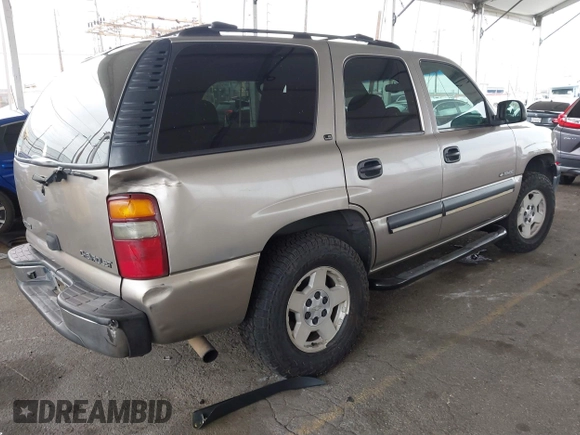 2002 Chevrolet Tahoe LS with VIN 1GNEC13T62R311933, listed as a IAAI auction lot 41895509 with 236,603 mi miles and . Bid and sale history available at DreamBid. Image 4.