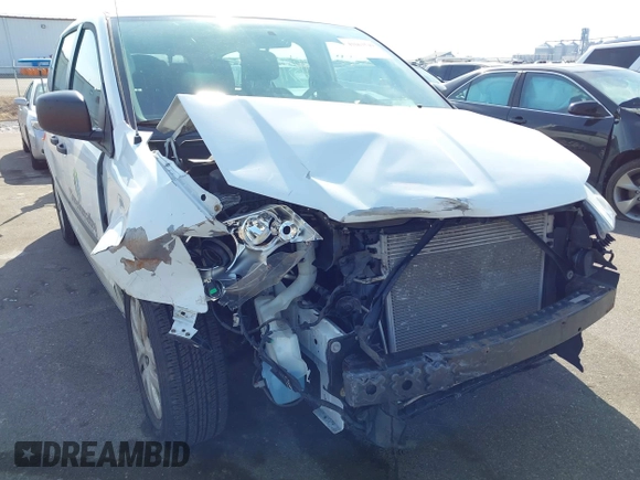2016 Dodge Grand Caravan SE with VIN 2C4RDGBG1GR392484, listed as a IAAI auction lot 41663549 with 126,882 mi miles and . Bid and sale history available at DreamBid. Image 18.