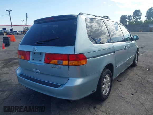 2003 Honda Odyssey EX-L with VIN 5FNRL18923B071598, listed as a IAAI auction lot 41947046 with 224,394 mi miles and . Bid and sale history available at DreamBid. Image 4.