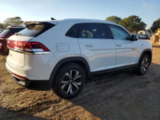 2024 Volkswagen Atlas SE with VIN 1V2DE2CAXRC210618, listed as a Copart auction lot 79875604 with 19,613 mi miles and Salvage title. Bid and sale history available at DreamBid. Image 3.