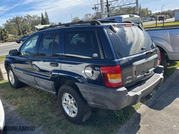 2004 Jeep Grand Cherokee Laredo with VIN 1J4GX48N24C436753, listed as a Copart auction lot 88142905 with 114,022 mi miles and Clean Title. Bid and sale history available at carsss.com. Image 3.