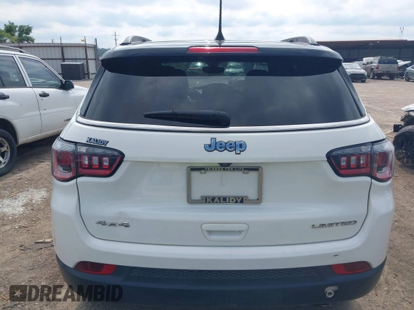 2018 Jeep Compass Limited with VIN 3C4NJDCBXJT298469, listed as a IAAI auction lot 42393665 with 61,589 mi miles and . Bid and sale history available at DreamBid. Image 16.