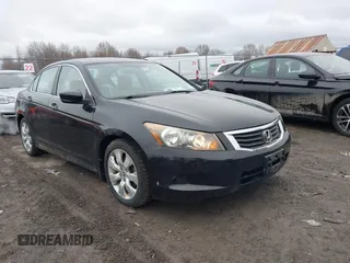 2010 Honda Accord EX with VIN 1HGCP2E75AA062842, listed as a IAAI auction lot 41792464 with 221,402 mi miles and . Bid and sale history available at DreamBid. Image 1.