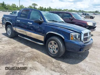 2006 Dodge Dakota SLT with VIN 1D7HE48K96S503482, listed as a IAAI auction lot 42412162 with 127,360 mi miles and . Bid and sale history available at DreamBid. Image 1.