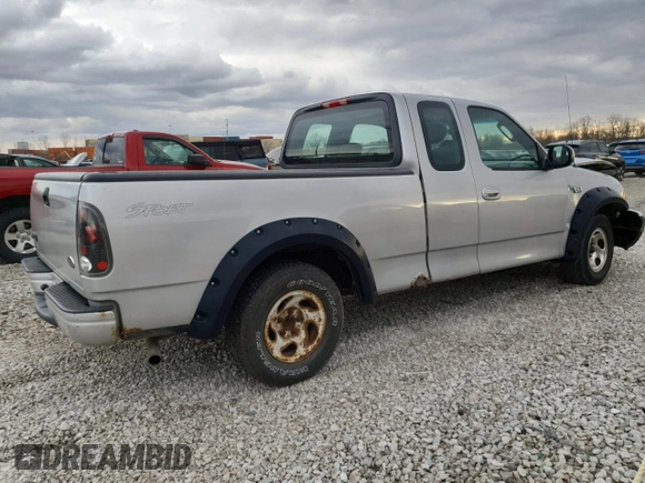 2002 Ford F-150 XL with VIN 1FTRX17232NB46169, listed as a Copart auction lot 49477685 with 182,508 mi miles and Salvage Title. Bid and sale history available at carsss.com. Image 3.