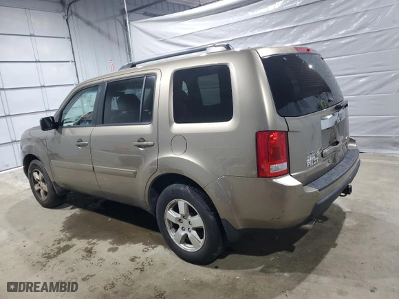 2011 Honda Pilot EX-L with VIN 5FNYF4H51BB041086, listed as a Copart auction lot 46243635 with 216,810 mi miles and Clean Title. Bid and sale history available at carsss.com. Image 2.