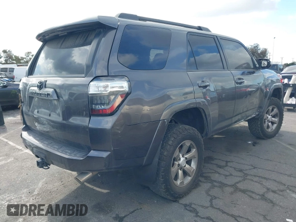 2018 Toyota 4Runner SR5 with VIN JTEBU5JR7J5606564, listed as a IAAI auction lot 41408904 with 149,936 mi miles. Bid and sale history available at carsss.com. Image 4.