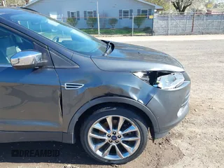 2015 Ford Escape SE with VIN 1FMCU9G97FUA89251, listed as a IAAI auction lot 41919240 with 148,472 mi miles and . Bid and sale history available at DreamBid. Image 17.