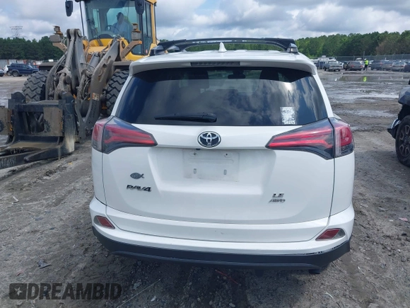 2017 Toyota RAV4 LE with VIN JTMBFREV8HJ700774, listed as a IAAI auction lot 42439345 with 96,907 mi miles and . Bid and sale history available at DreamBid. Image 16.