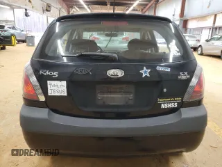 2009 Kia Rio LX with VIN KNADE243896580883, listed as a Copart auction lot 43735505 with 135,726 mi miles and Salvage Title. Bid and sale history available at carsss.com. Image 6.